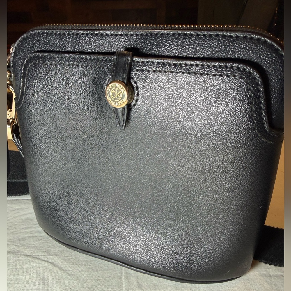 Calvin Klein Adara Daytona North/South Crossbody bag in black faux leather